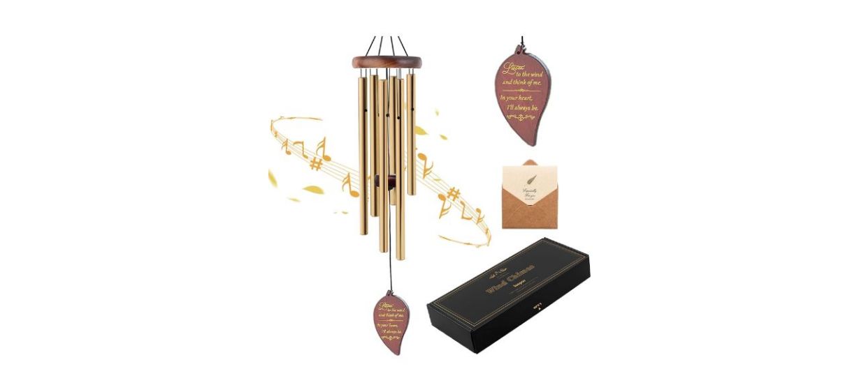 gold-colored wind chimes with wooden circular top and a middle piece with text on it gold-colored wind chimes with wooden circular top and a middle piece with text on it