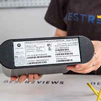 Sticker with key information on bottom of cable modem-router